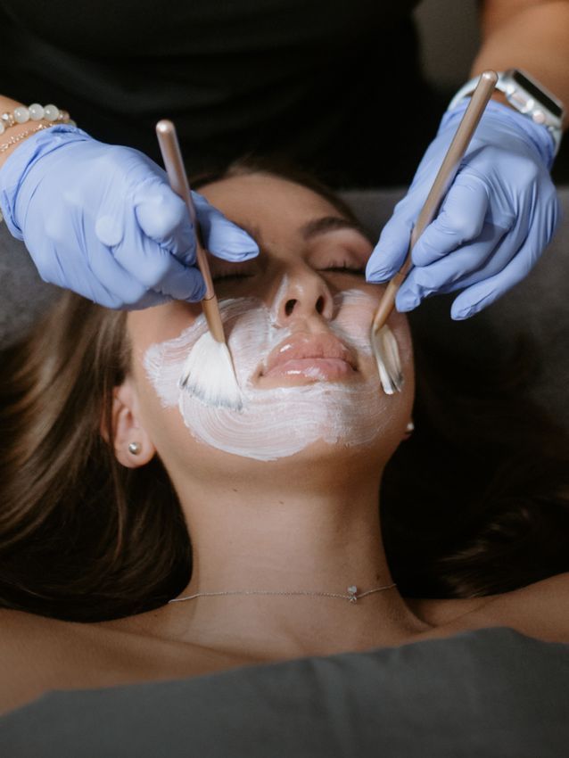 Crown Point Med spa model undergoing facial treatment